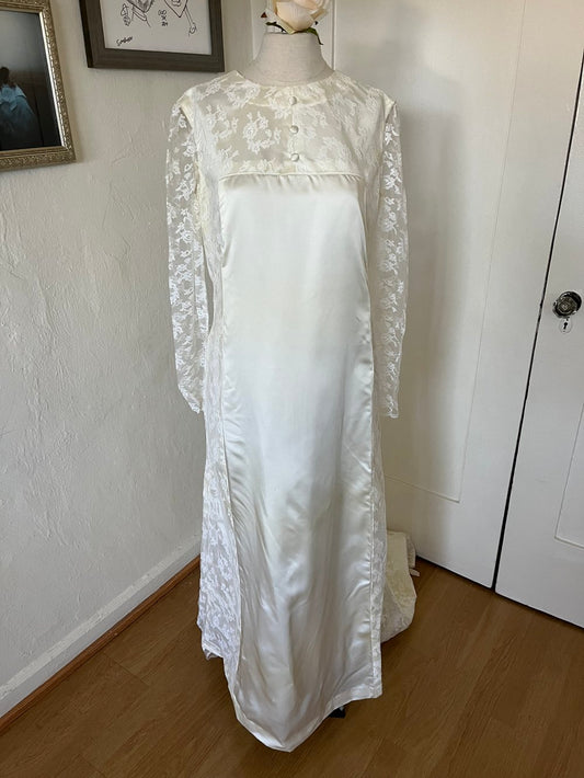 1960's Caped Wedding Gown on mannequin