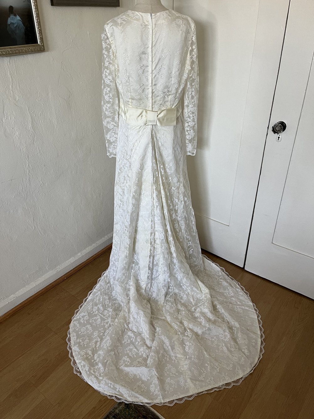 1960's Caped Wedding Gown on mannequin from behind