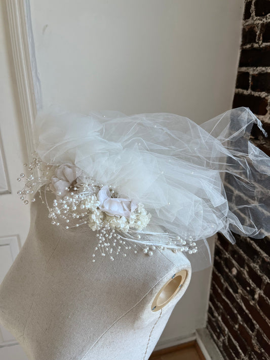 1980's Flower Crown with Tulle Puffs on a manakin.