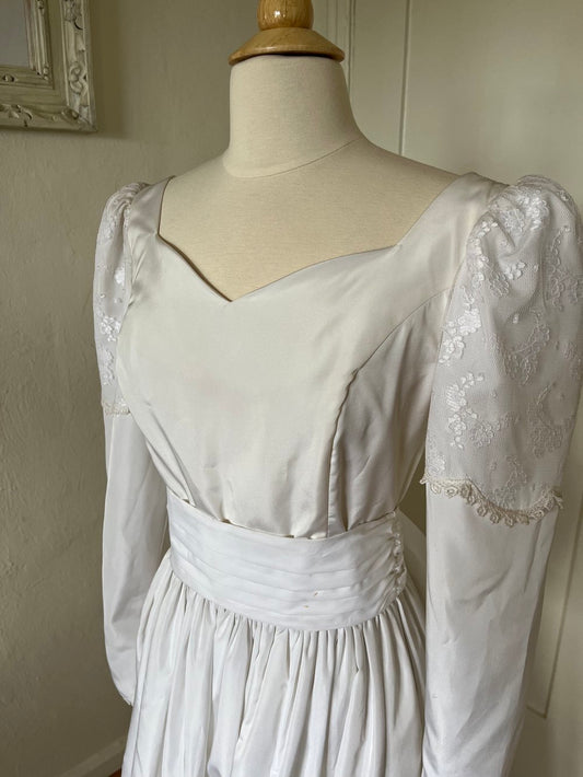 1980’s Princess Sleeve Satin Gown on mannequin close up angle