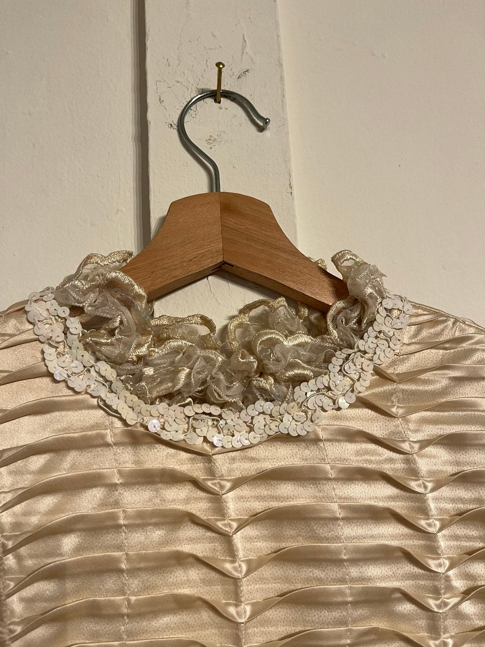 1980's Tiered Midi Dress on a hanger close up