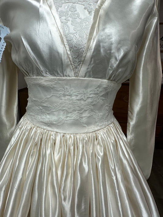 Closeup shot of the front of a "Stella" 1950's Wedding Gown.